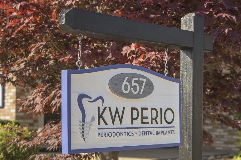 The KW Perio sign outside 657 Belmont Avenue West